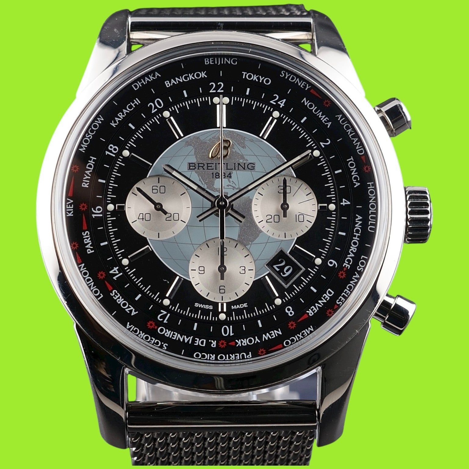 Breitling Transocean Unitime AB0510 – World Time Chronograph B05