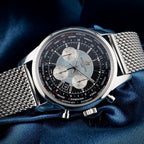 Breitling Transocean Unitime AB0510 – World Time Chronograph B05