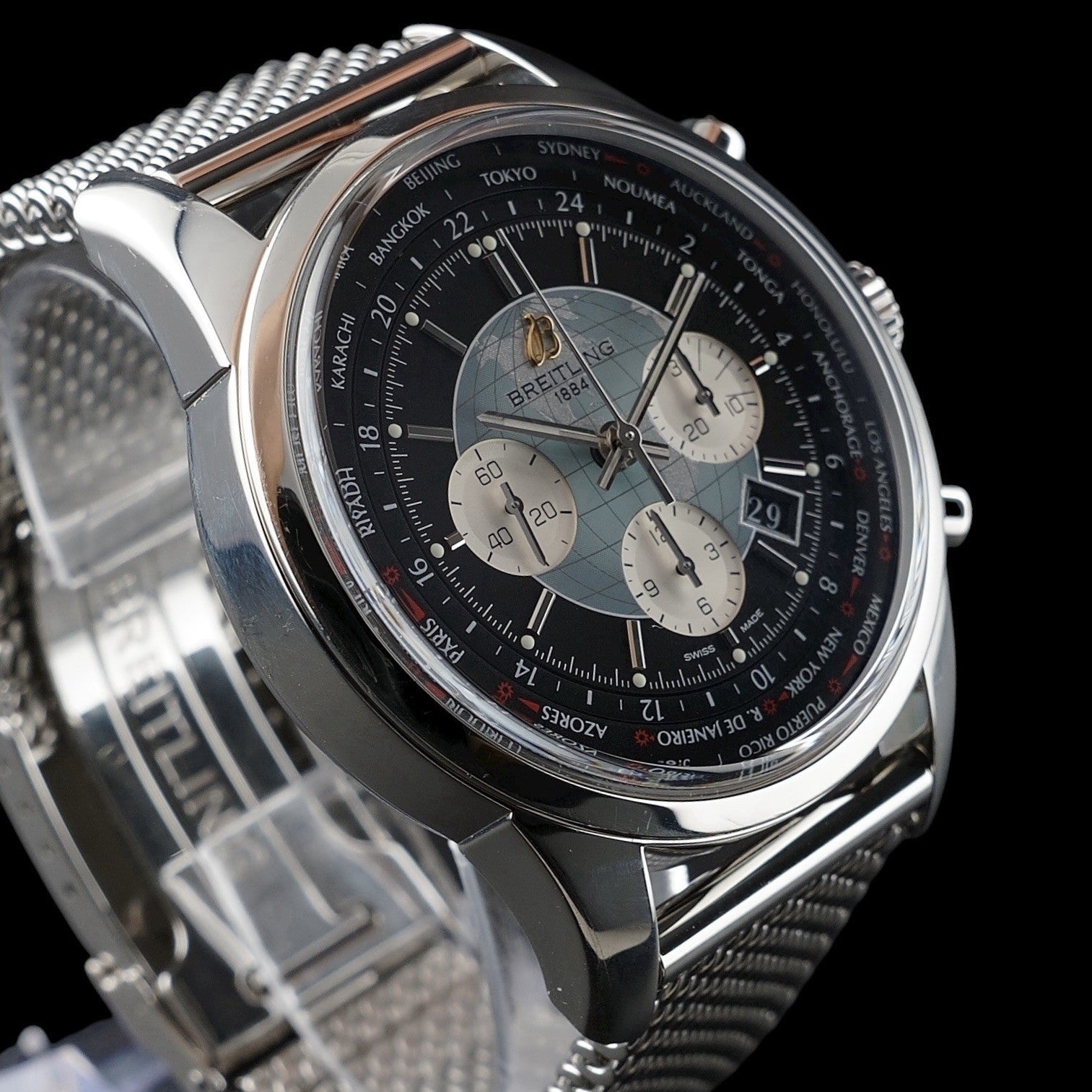 Breitling Transocean Unitime AB0510 – World Time Chronograph B05