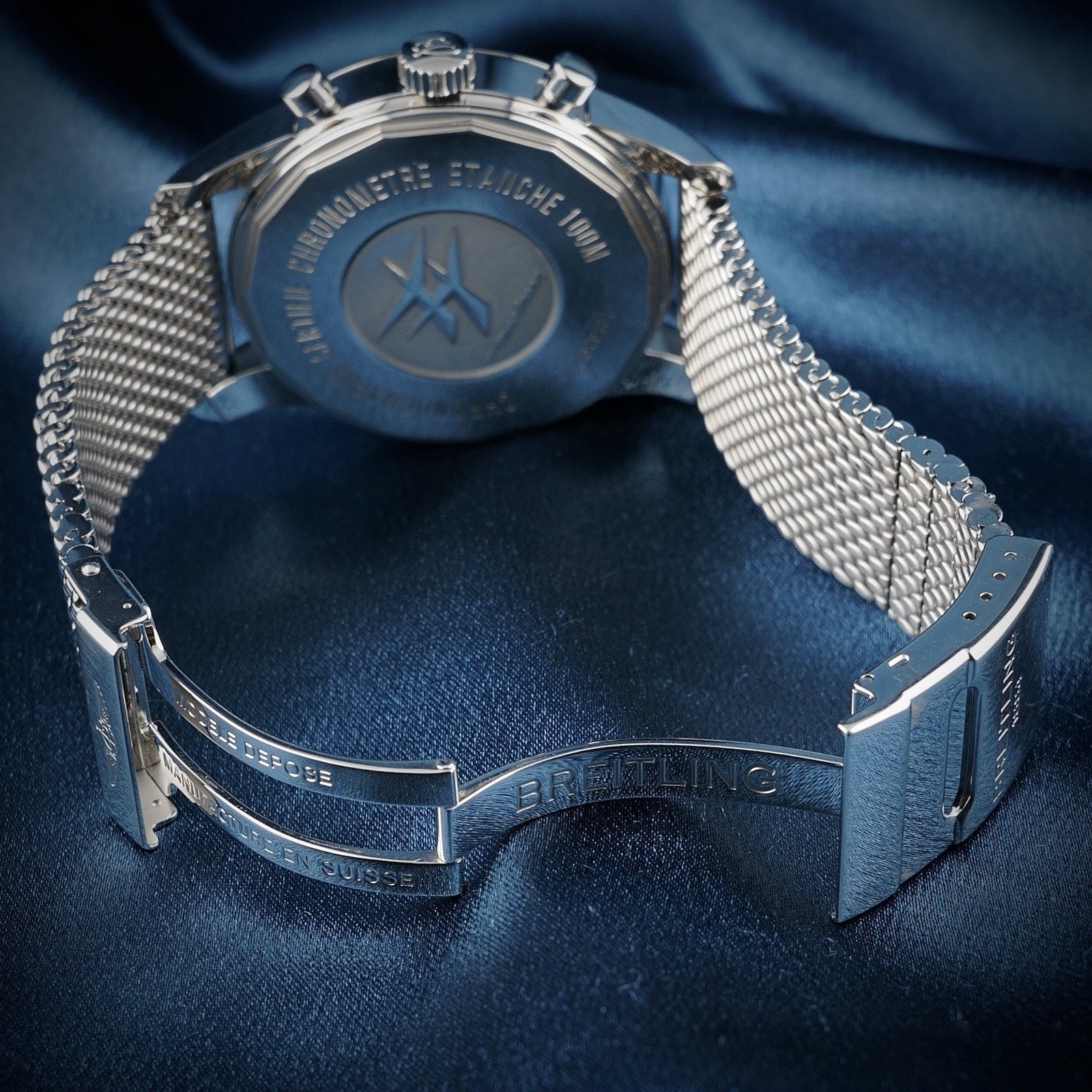 Breitling Transocean Unitime AB0510 – World Time Chronograph B05