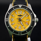 Breitling Superocean A17367 44mm Yellow Dial Steel Bracelet — front-facing dial shot
