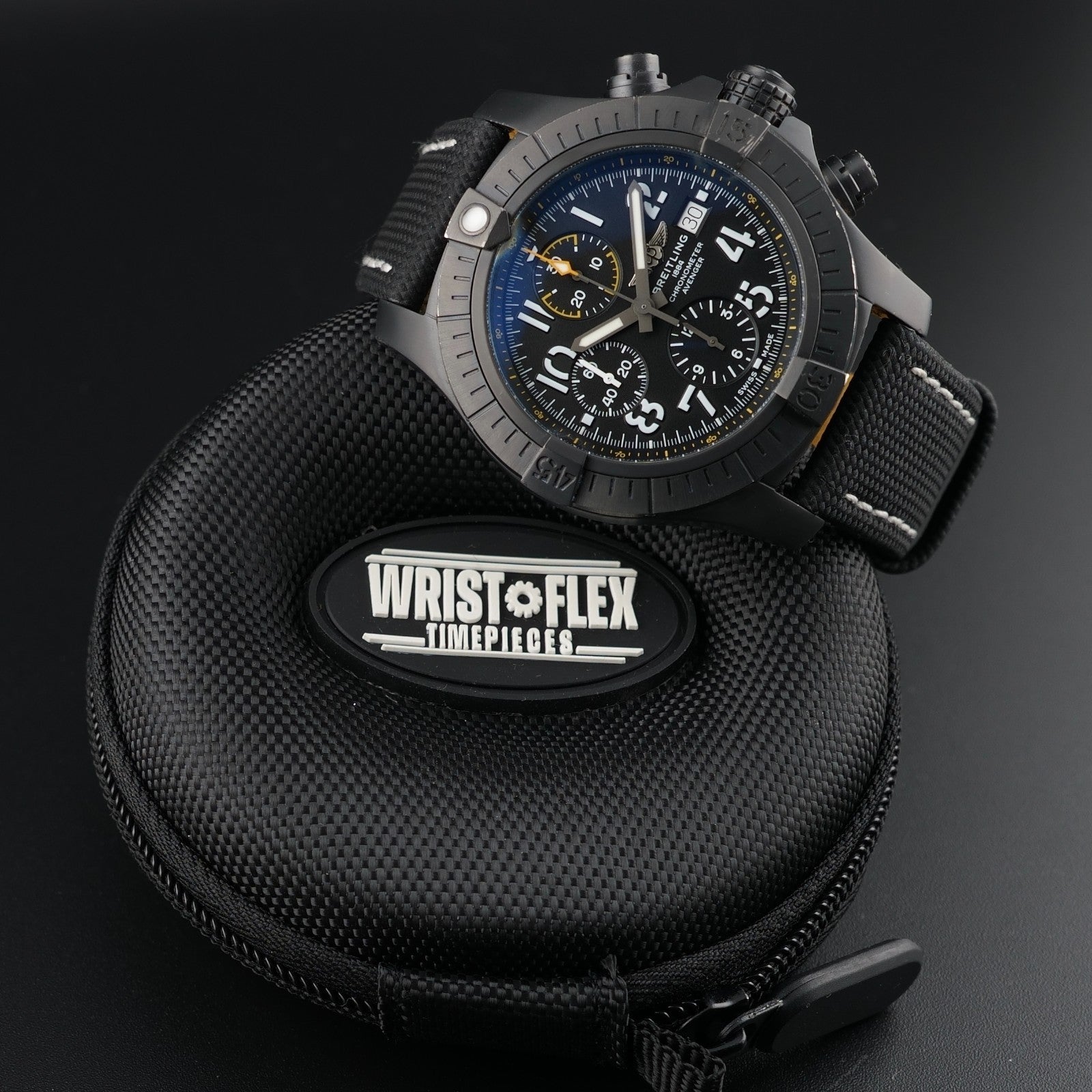 Breitling Avenger Night Mission V13317 chronograph subdials black dial close view
