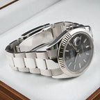 Side profile of Rolex Datejust 41 126334 showing the stainless steel case and Oyster bracelet.