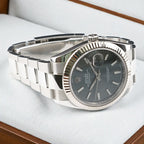 Rolex Datejust 41 126334 with slate stick dial and fluted bezel displayed on a white cushion.