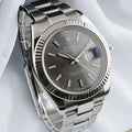 Rolex Datejust 41 126334 with slate stick dial, fluted bezel and stainless steel Oyster bracelet, angled front view.