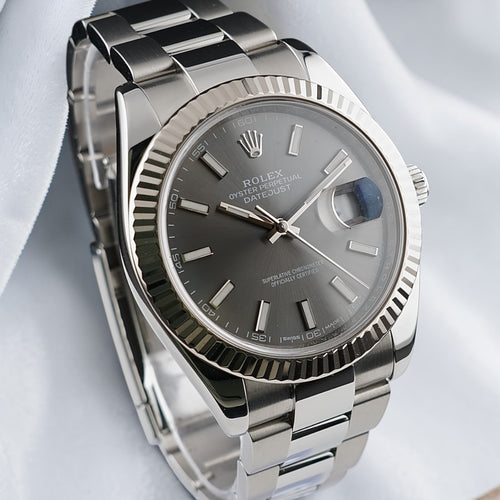 Rolex Datejust 41 126334 with slate stick dial, fluted bezel and stainless steel Oyster bracelet, angled front view.