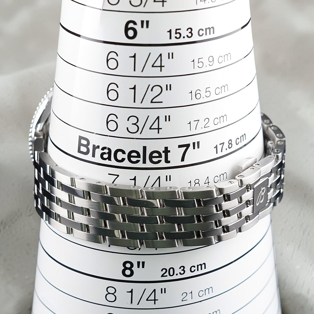 Wrist Flex Timepieces Breitling Navitimer 36 stainless steel watch bracelet on a sizing cone showing size 7 inches