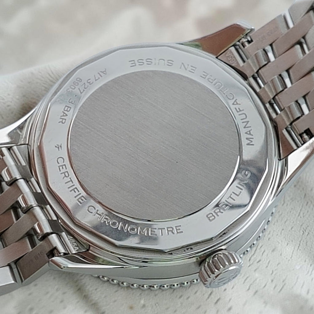 Wrist Flex Timepieces Breitling Navitimer 36 stainless steel watch case back with engraved chronometer details