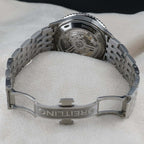 Wrist Flex Timepieces Breitling Navitimer stainless steel watch showing the exhibition caseback and rouleaux bracelet