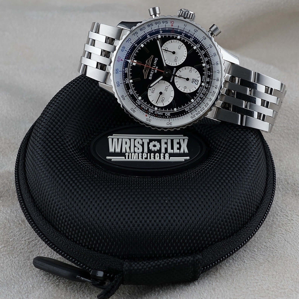 Wrist Flex Timepieces Breitling Navitimer B01 chronograph watch with black reverse panda dial and stainless steel bracelet