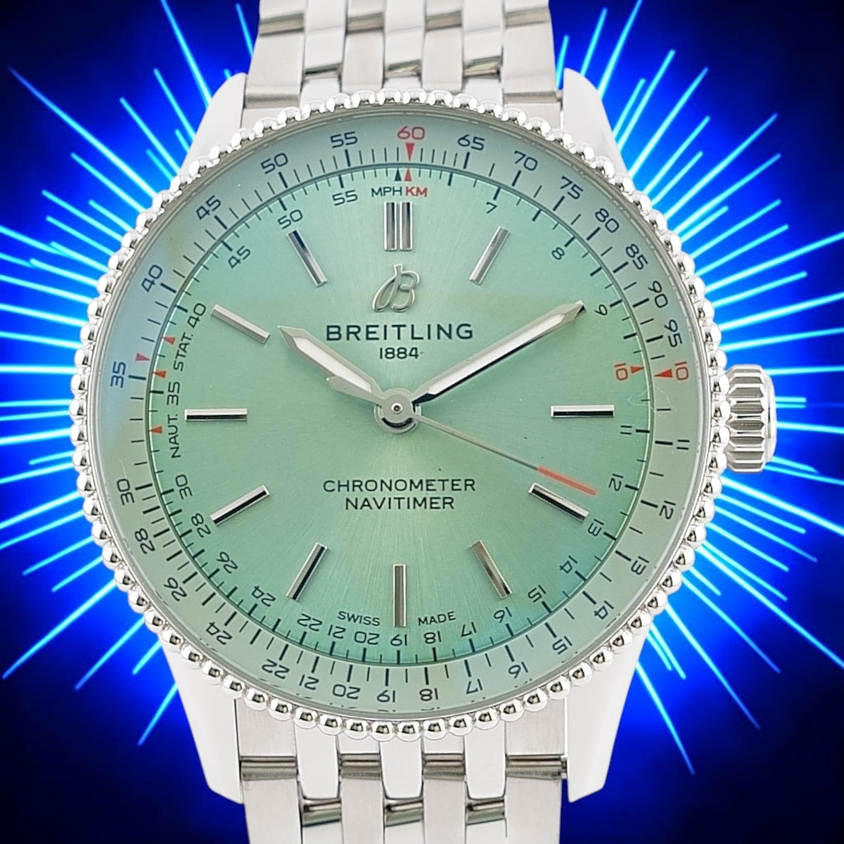 Wrist Flex Timepieces Breitling Navitimer Automatic 36 watch with a mint green dial and stainless steel bracelet.