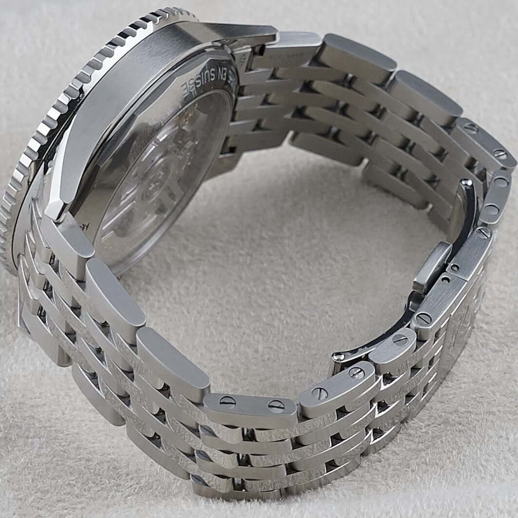 Wrist Flex Timepieces Breitling Navitimer stainless steel rouleaux bracelet and exhibition caseback view