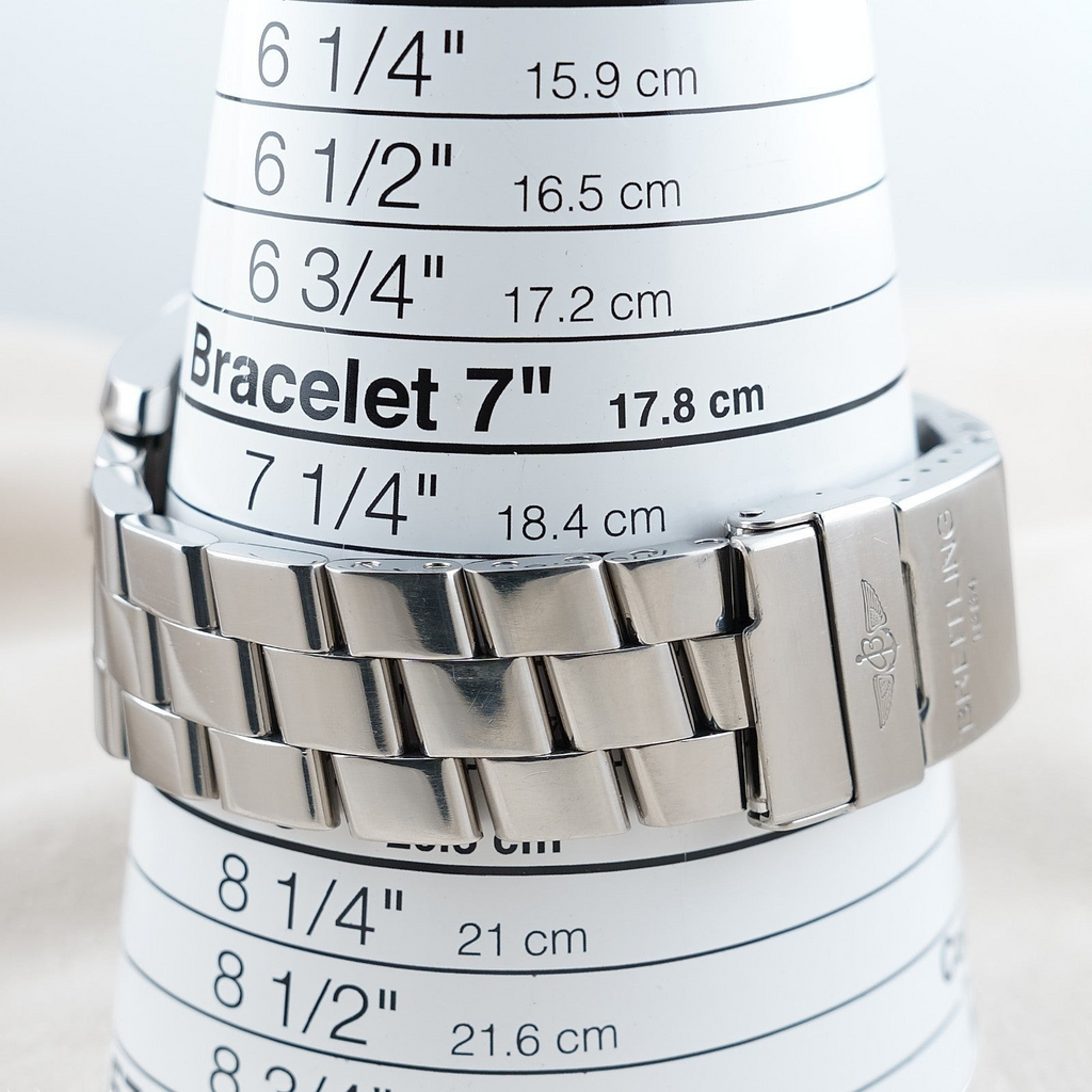 Wrist Flex Timepieces Breitling Super Avenger stainless steel watch bracelet on a sizing cone showing wrist measurement