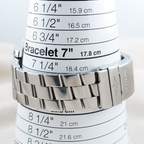 Wrist Flex Timepieces Breitling Super Avenger stainless steel watch bracelet on a sizing cone showing wrist measurement