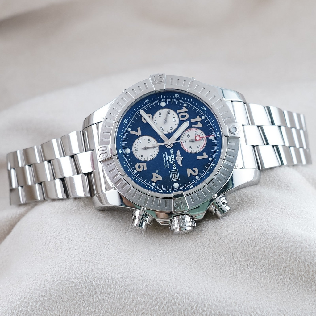 Wrist Flex Timepieces Breitling Super Avenger 48mm chronograph watch with blue dial and stainless steel bracelet