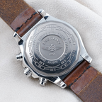 Wrist Flex Timepieces Breitling Super Avenger A13370 stainless steel watch case back with brown leather strap