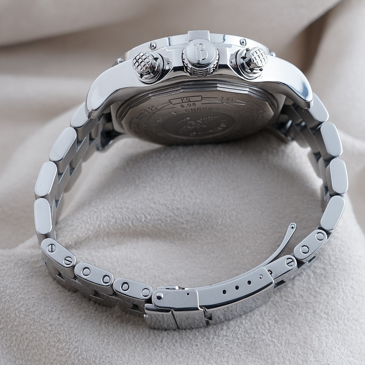 Wrist Flex Timepieces Breitling Super Avenger chronograph watch showing the stainless steel case back and bracelet