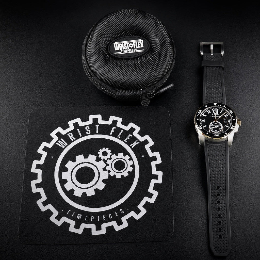 Wrist Flex Timepieces Cartier Calibre de Cartier Diver watch with black rubber strap, gold bezel, and display mat.