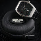 Wrist Flex Timepieces Franck Muller Vanguard V45 watch with brushed titanium tonneau case and black dial on travel case