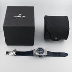 Wrist Flex Timepieces Hublot Big Bang 41mm watch with blue dial, diamond bezel, and alligator strap, including box.