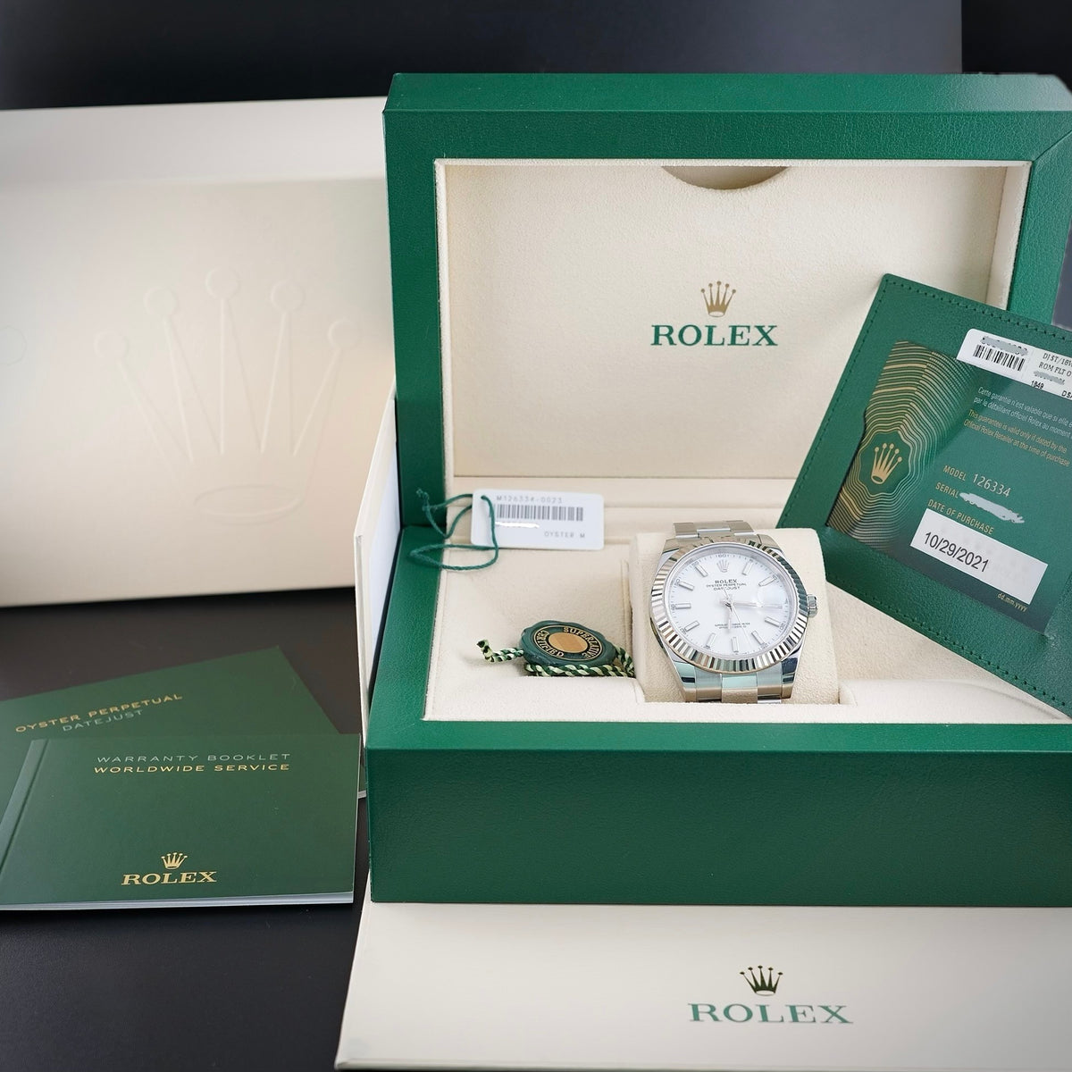 Wrist Flex Timepieces Rolex Datejust 41 126334 with white dial, fluted white gold bezel, and Oyster bracelet in box