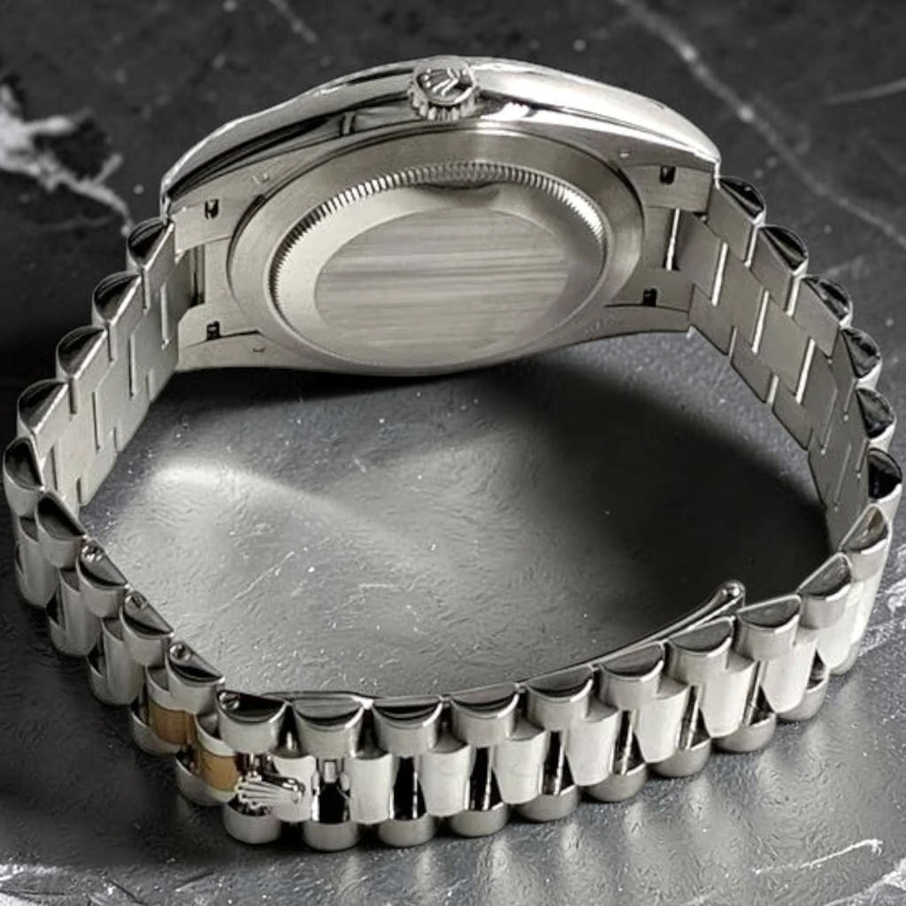 Wrist Flex Timepieces Rolex Day-Date watch showing the back of the case and the iconic President bracelet links.