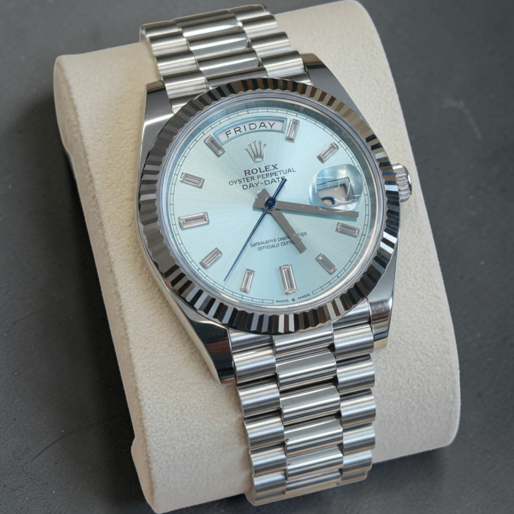 Wrist Flex Timepieces Rolex Day-Date with ice-blue dial, baguette diamond markers, fluted bezel, and President bracelet