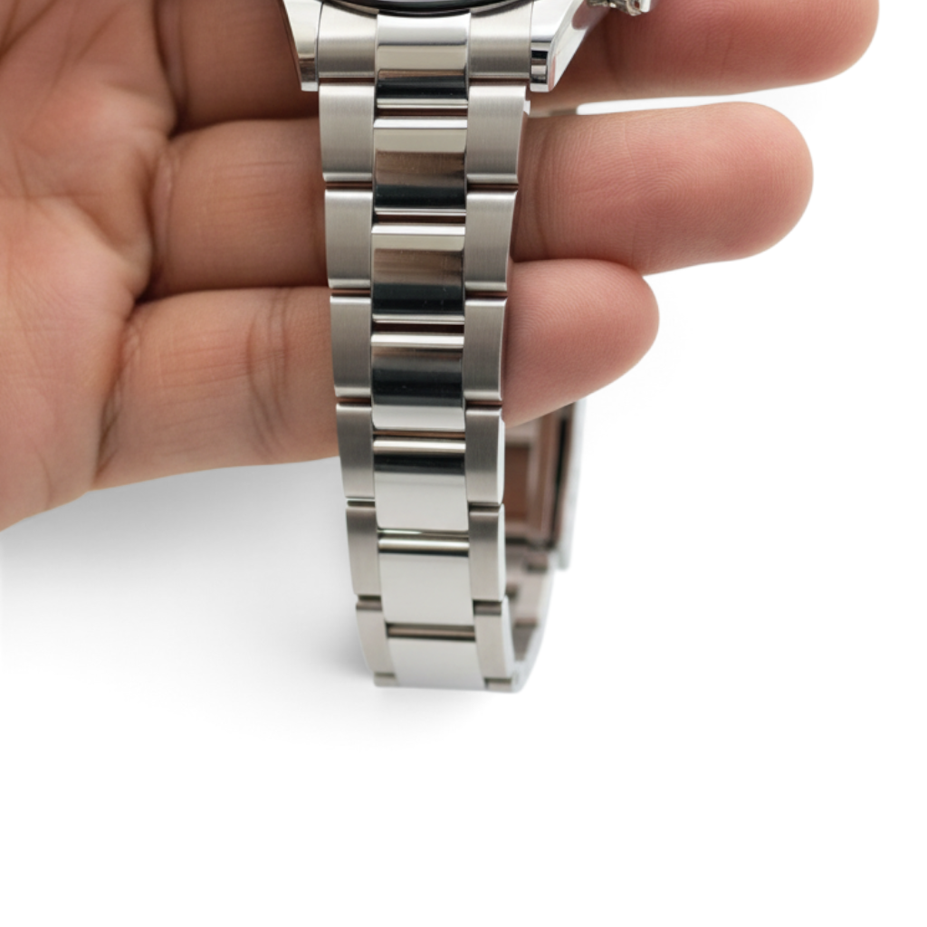 Wrist Flex Timepieces Rolex Daytona 116500LN stainless steel Oyster bracelet held in hand against white background
